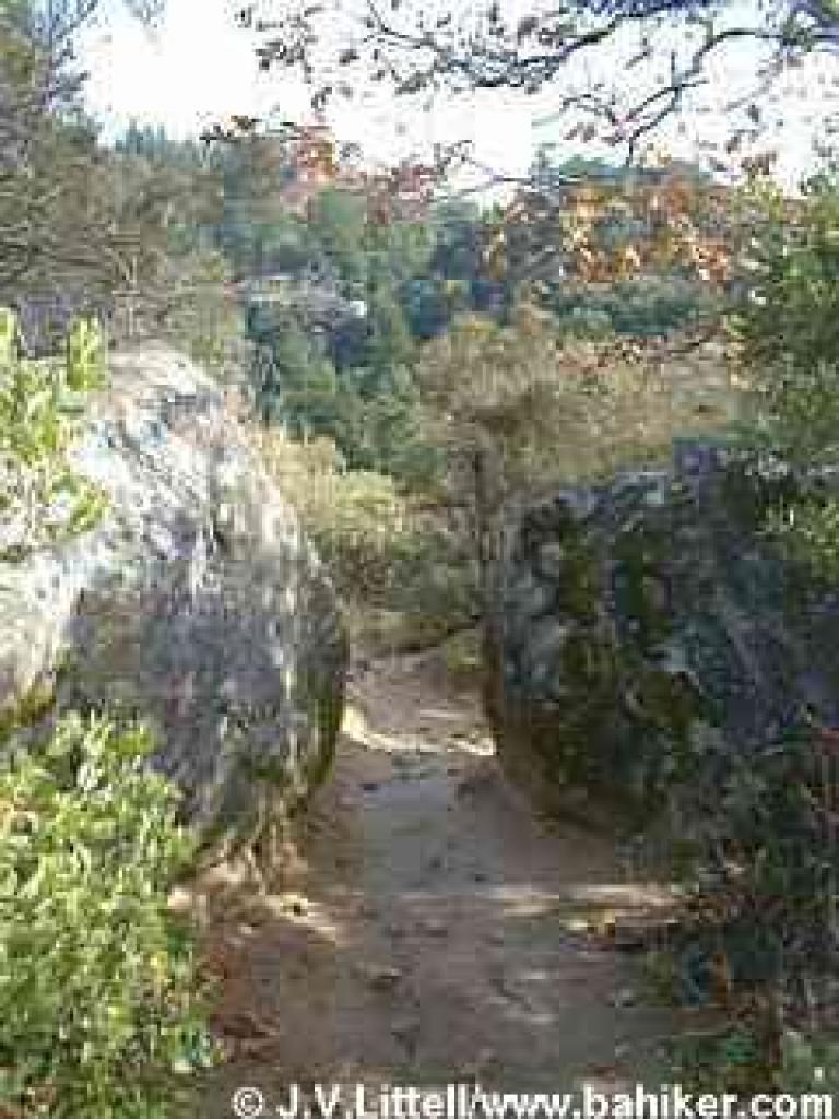 Squeezing past two rocks