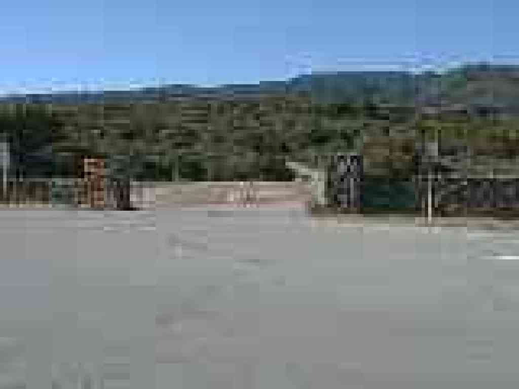 Walk through the stone gates, then turn right