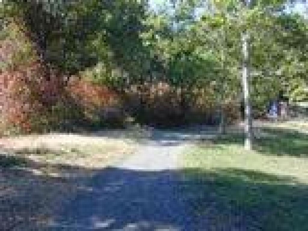 Approaching junction with path to restrooms