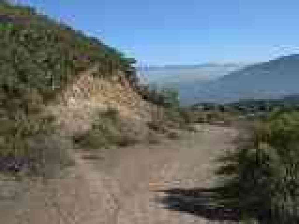 Bicycle tracks cut into the hill
